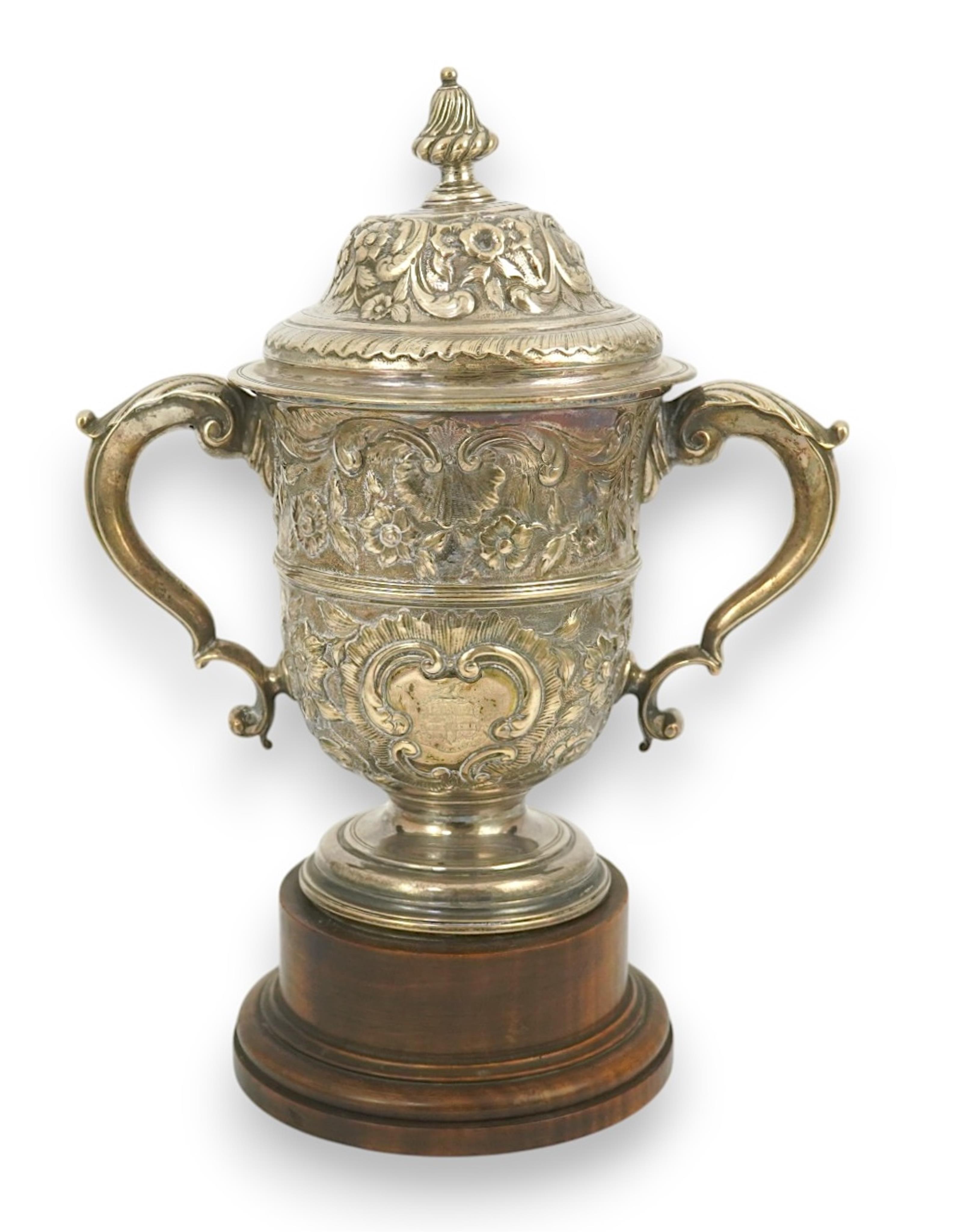 A George II silver loving cup with later floral embossed decoration, maker's initials RI, London, 1745